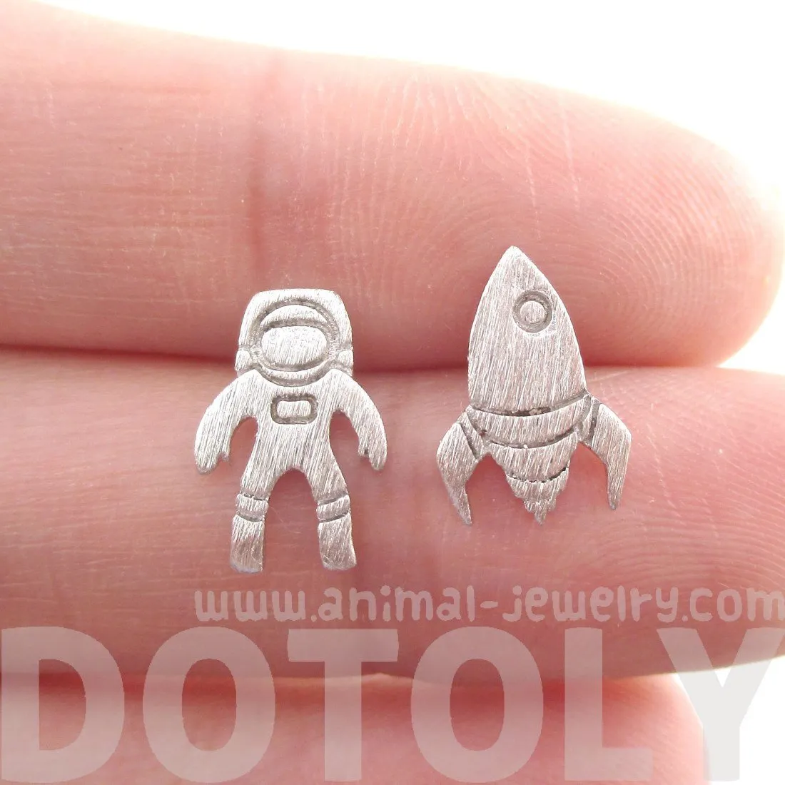 Spaceship and Astronaut Space Travel Themed Stud Earrings in Silver | DOTOLY